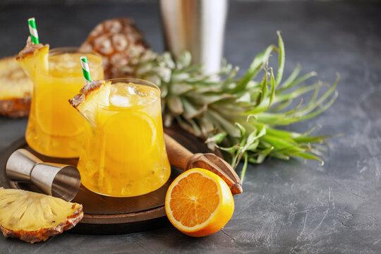 Fresh pineapple alcoholic cocktail with ice. Summer cocktail and bar concept.
