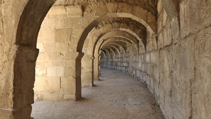 Arched stone corridor  at theupper part of the Aspendos Ancient Theatre