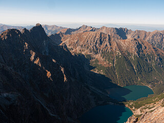 Sunset on Mount Rysy in the Tatras overlooking a mountain lake