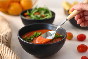 salad tomato soup and chips in black bowl healthy eating, healthy lifestyle