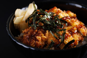 Tonkatsu teriyaki sauce with rice japanese food isolate in black background