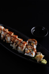 Eel Maki Maki roll made of Smoked Eel Japanese food Japanese cuisine Japanese seafood Isolate in black background