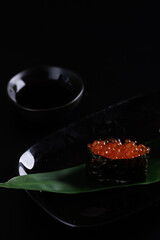 Ikura sushi Japanese food Japanese seafood isolated in black background
