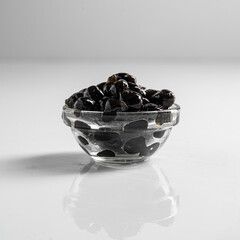 Chewy boba in a glass bowl on a white background 