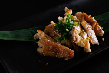 Chicken Teriyaki grill chicken Japanese Food isolate in black background