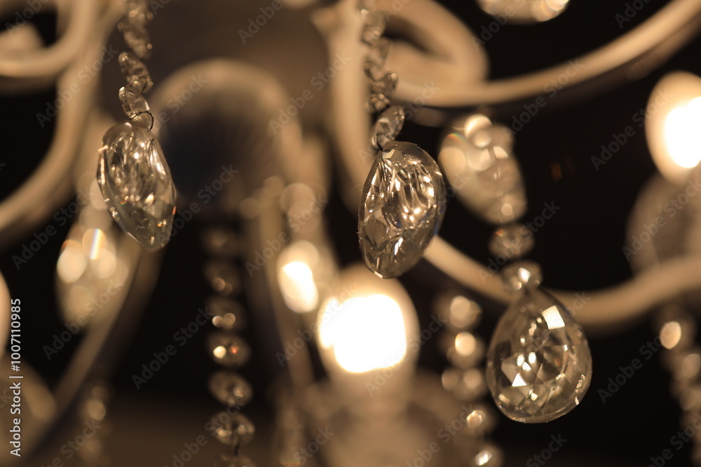 Poster A close-up shot of a decorative chandelier with multiple lights.