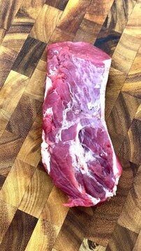 raw and delicious and tender juicy pork tenderloin.