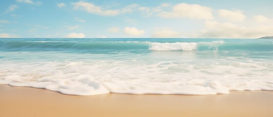 Obraz premium Soft wave of the sea on the sandy beach. Seascape background