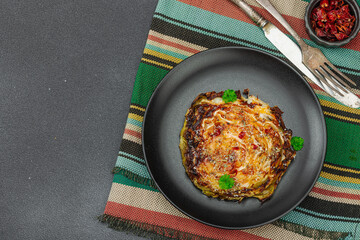Homemade vegan cabbage steaks with herbs and spices. Healthy food ready to eat on a serving plate