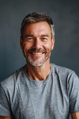 Fototapeta premium A person with a long beard smiling directly into the camera