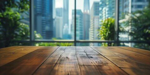 Wooden table in a modern office with blurred cityscape and greenery, ideal for product mockups and presentations