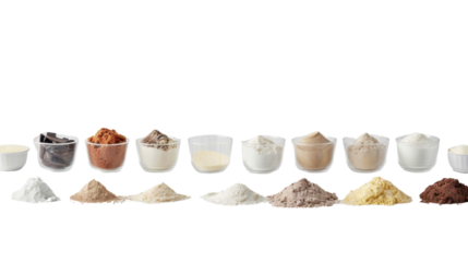 Baking ingredients lined up on a kitchen counter, on white background