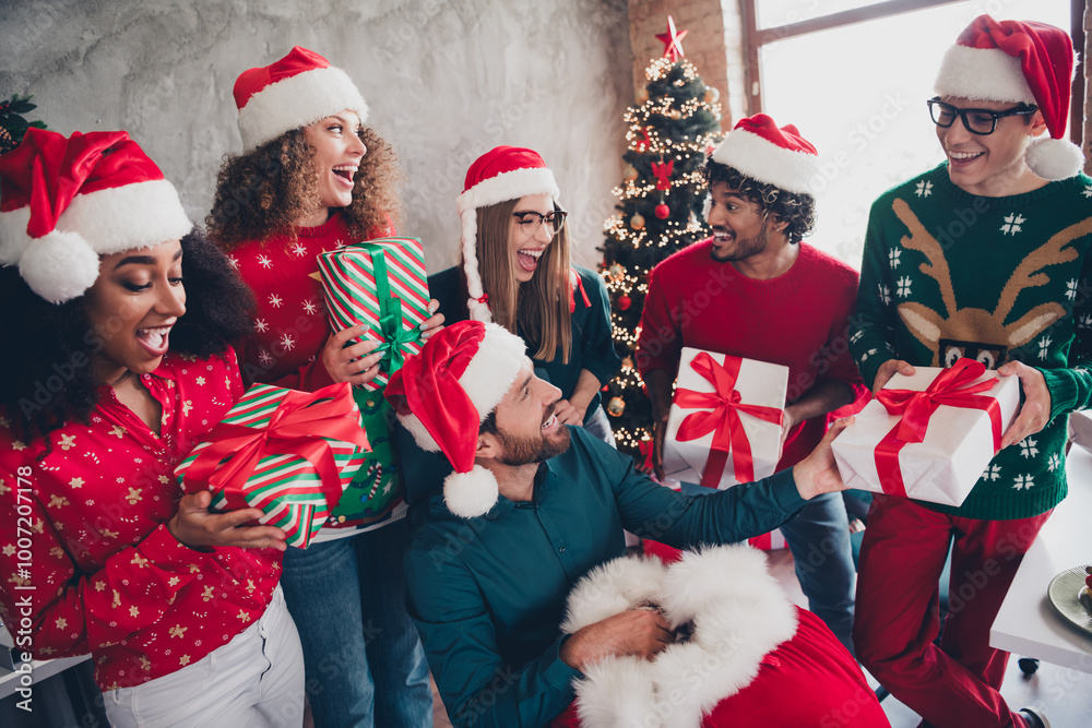 Canvas Prints Portrait of group friends colleagues get christmas giftbox santa boss festive party loft office indoors