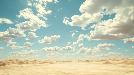 Fototapeta premium A wide shot of desert dunes with a blue sky and white clouds