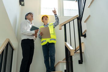 inspector engineer and owner project is inspecting construction and quality assurance new house....