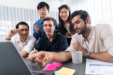 Fototapeta premium Group of diverse office worker employee working together on strategic business marketing planning in corporate office room. Positive teamwork in business workplace concept. Prudent