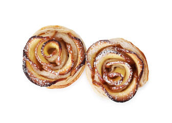 Freshly baked apple roses isolated on white, top view. Puff pastry