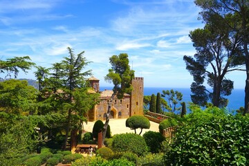 Castell de Cap Roig in the botanical garden Jardins de Cap Roig Mediterranean Sea behind, Calella de Palafrugell, Costa Brava, Girona, Catalonia, Spain