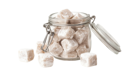 Candies in jar on white background