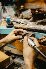 Jeweler Cleaning a Ring