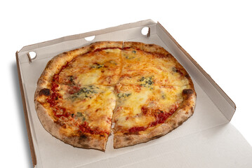 Pizza with tomato and mozzarella cut into four slices on take-out cardboard box isolated