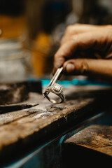 Jeweler Cleaning a Ring