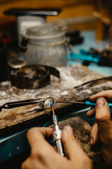 Jeweler Cleaning a Ring
