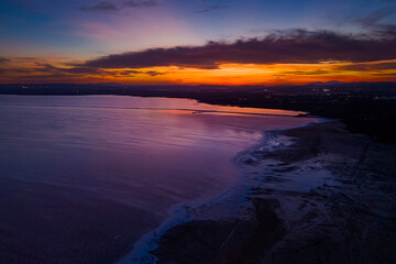 Fototapeta premium Aerial view of sunset in the salt flats of Torrevieja, Alicante province, Spain