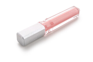 Beautiful liquid pink lipstick on white background