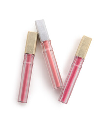 Beautiful liquid pink lipsticks in different shades on white background