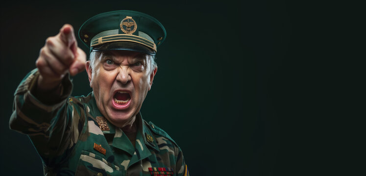 Drill sergeant with angry face expression pointing finger to camera, studio photo copy space on side. Generative AI