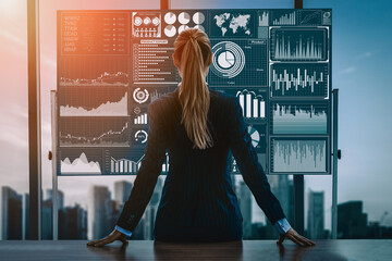 Big Data Technology for Business Finance Analytic Concept. Modern interface shows massive information of business sale report, profit chart and stock market trends analysis on screen monitor. uds