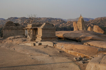 Temples on the gentle slopes of Hemakutta Hill in Hampi. India.