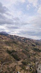 Scenic Rural Landscape Beneath Dramatic Clouds at Dusk