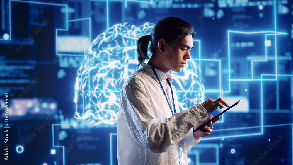 Fototapete Hardworking system administrator in data center uses artificial intelligence computing simulating human brain thought processes. Server room manager works on tablet with AI machine learning algorithms