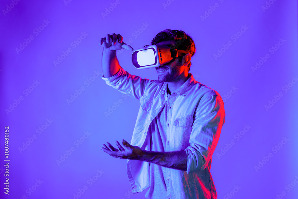 Poster side view of happy man holding and moving gesture while using vr goggle. happy person using headset 