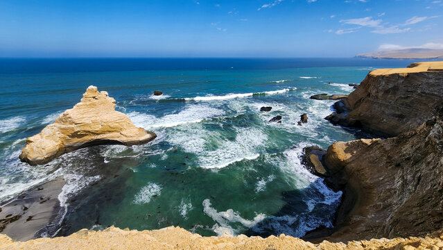 CLIFF TO THE SEA. PARACAS CATHEDRAL. PARACAS NATIONAL RESERVE. PERU.