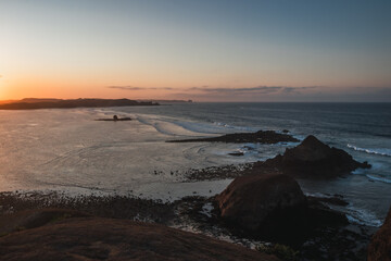 Sunset on a rocky coastline