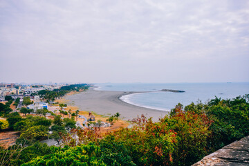 Fototapeta premium Kaohsiung, Taiwan, Republic of China, 01 25 2024: The landscape of Cijin island, lighthouse and cihou fort