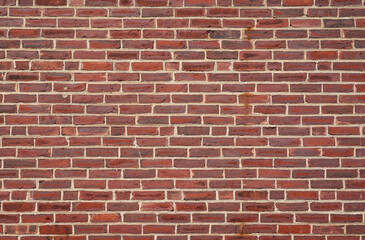 facade view of old grunge brick wall background