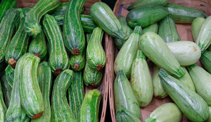 fresh green zucchini isolated on white background