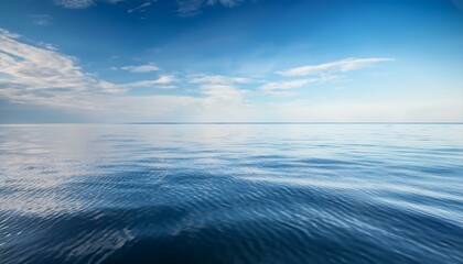 Fototapeta premium Calm blue sea with a clear sky