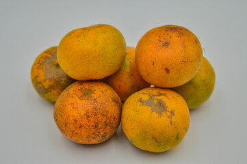 Orange fruits on white background