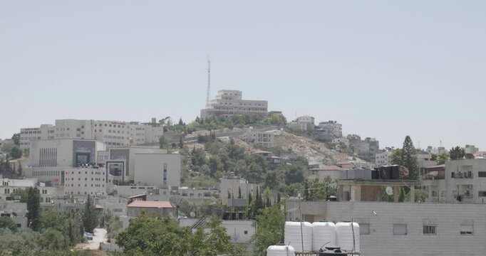 Cityscape in the Foreground and Newer Colonies in the Background with White Stone Classic Architecture
