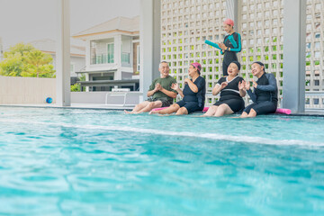 A group of seniors enjoys a lively water exercise class, led by an instructor at a poolside. They splash, laugh, and engage in fun activities, staying active and promoting health and wellness.