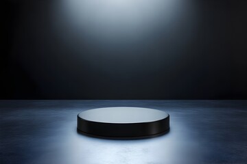 Elegant Minimal Black Podium on Spotlit Stage in Dark Studio for Product Presentation or Marketing Display