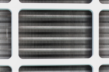 close up of the AC radiator grille. outdoor electronic devices