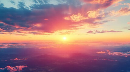 Naklejka premium Vibrant Sunset Over Serene Horizon, a stunning landscape showcasing a brilliant sunset blending with the horizon, casting rich colors and textures across a tranquil sky.