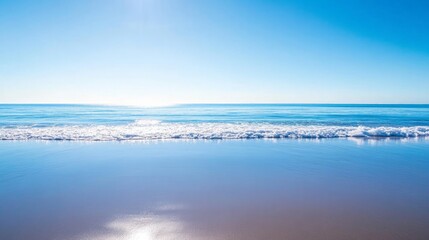 Obraz premium Tranquil Seascape, a serene sea mirroring a clear blue sky, gentle waves caressing the shore, creating an atmosphere of peace and relaxation, ideal for calming settings.