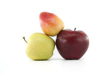 Red apple, green apple, and pear fruit trio on white background